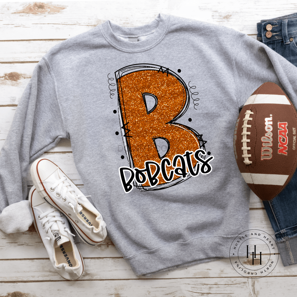 Bobcats Orange Glitter Varsity Doodle Unisex Tee