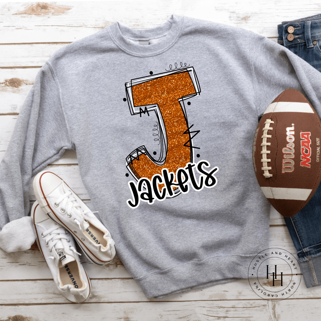 Jackets Orange Glitter Varsity Doodle Graphic Tee Unisex Tee