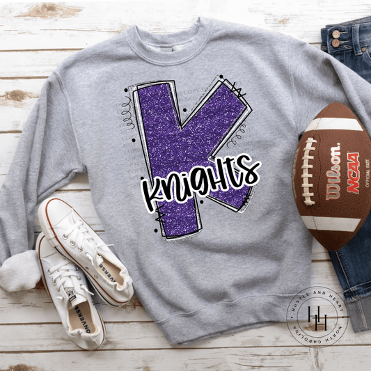 Knights Purple Glitter Varsity Doodle Graphic Tee Unisex Tee