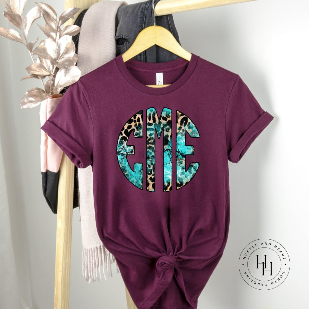 Turquoise Leopard Monogram Graphic Tee- Maroon Shirt